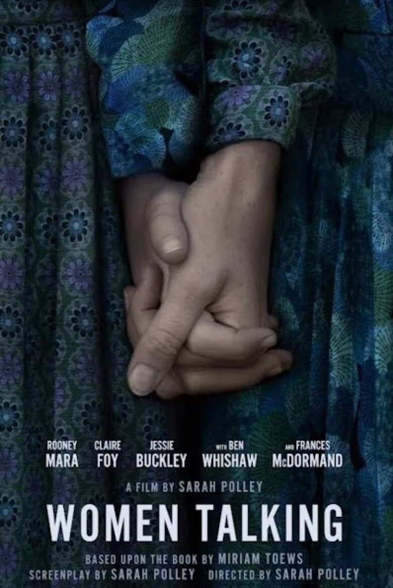 A movie poster shows a close up of two hands clasped in front of flowered fabric