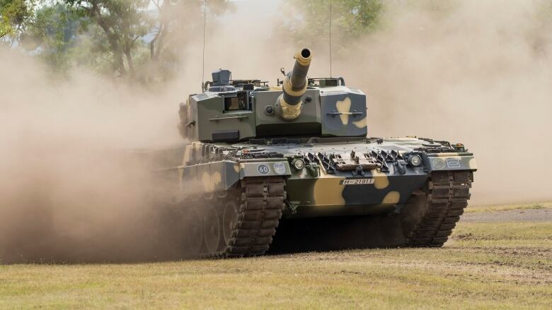 A tank is driven during a demonstration.