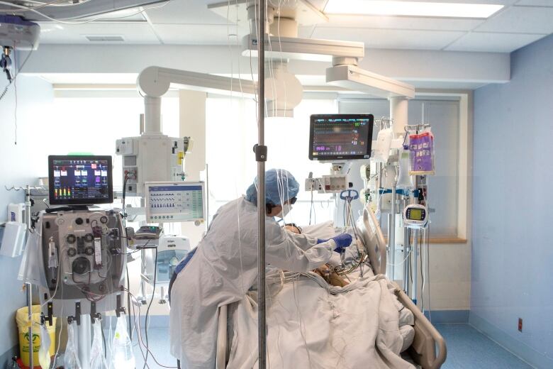 A nurse tends to a patient in Sarnia, Ontario. 