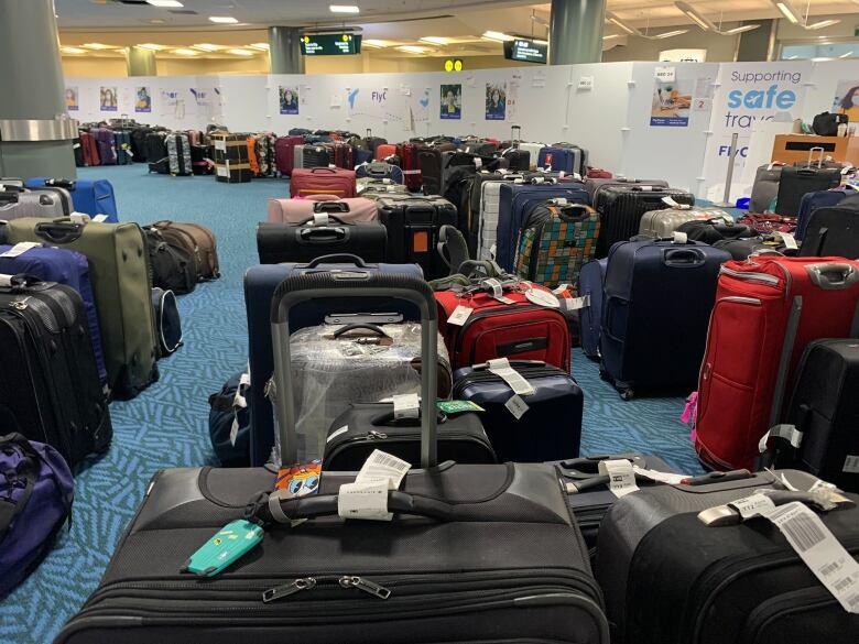 Unclaimed checked bags are shown at the Vancouver International Airport.