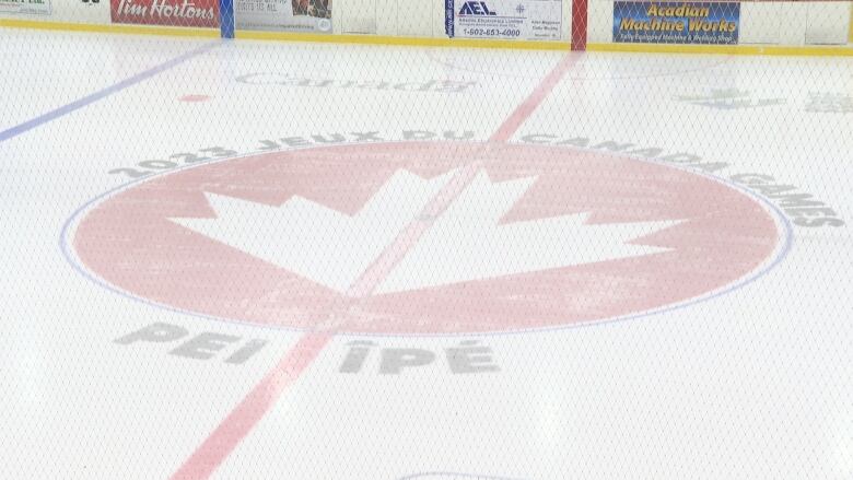 Centre ice of a hockey arena. 