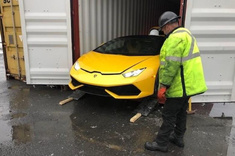 A sports car in a containter at the Old Port.