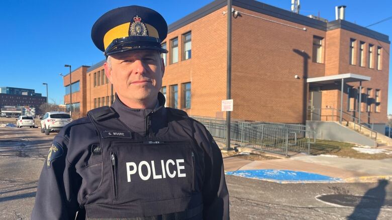 Police constable stands in front of RCMP detachment in Charlottetown