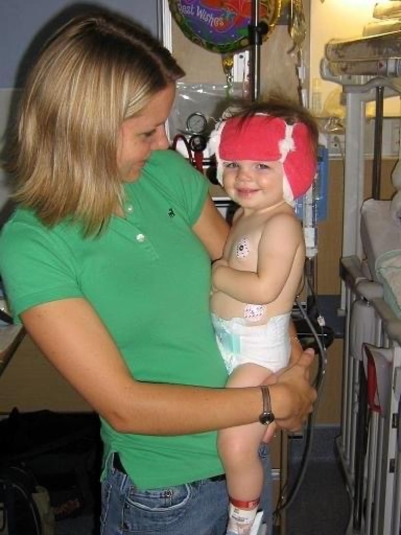 Kristin Noonan holds baby Makiya after surgery. 