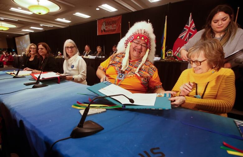 From left, Rochelle Squires, Manitoba Minister of Families, Manitoba Premier Heather Stefanson, Patty Hajdu, Minister of Indigenous Services Canada, Peguis Chief Glenn Hudson and Louise McCorrister, Peguis Child and Family Services Board Chair, sign the Peguis First Nation Honouring our Children, Families and Nation Act Coordination Agreement in Winnipeg, Tuesday, January 31, 2023.  The governments of Canada and Manitoba joined Peguis Chief Glenn Hudson and Peguis CFS for this historic event.