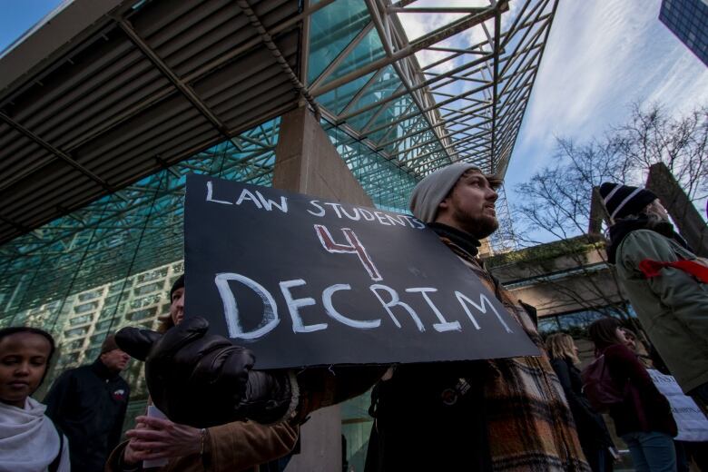 Advocates for drug decriminalization at a rally in 2018. This week, the province began a three-year pilot that will allow possession of small amounts of drugs.