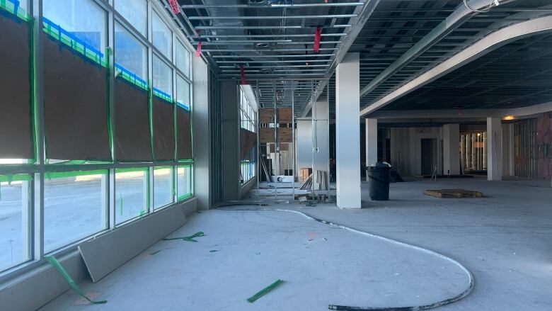 The inside of the entryway of a hotel under construction.