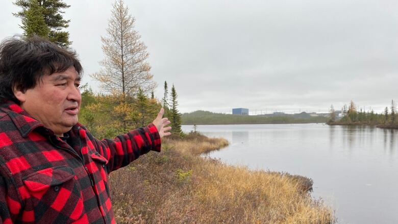 Man near lake.