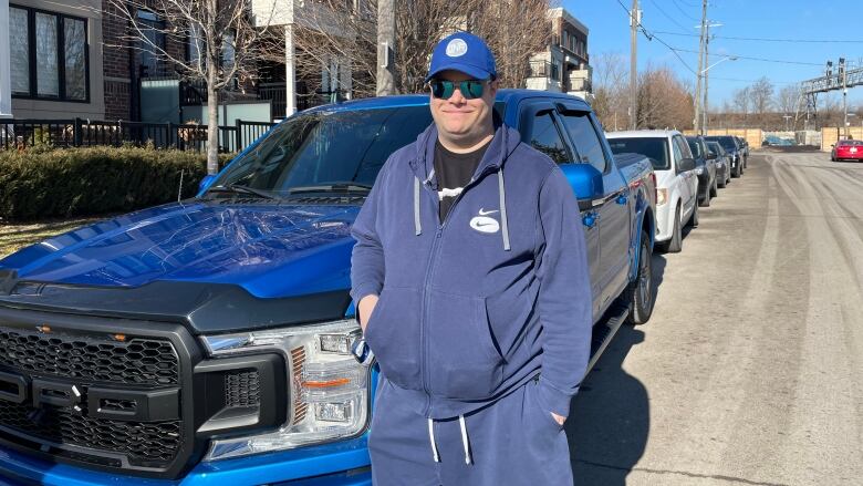 Alan Regnier, standing next to his recovered truck.