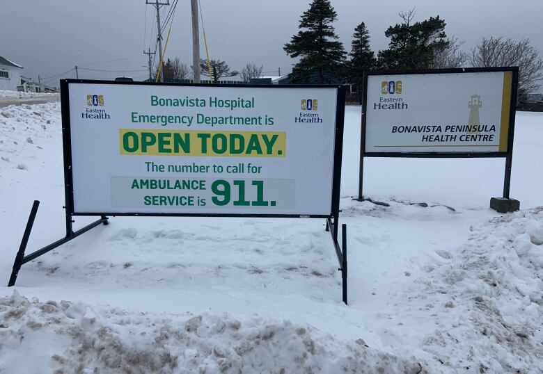 Two signs. The one on the left states that the Bonavista emergency department is open today. The one on the right is the sign for the Bonavista Peninsular Health Centre.