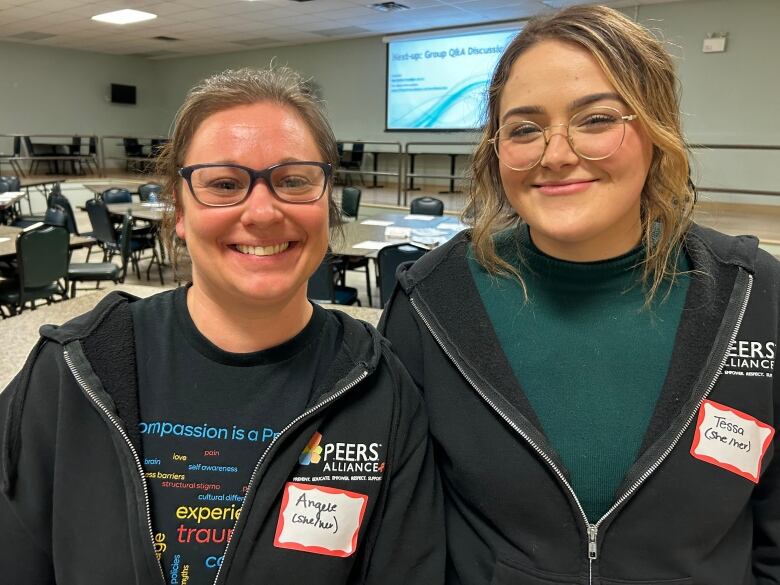 Angele DesRoches, program director with PEERS, left, and Tessa Rogers, street outreach coordinator for PEERS at a public meeting for a safe injection site in Charlottetown.