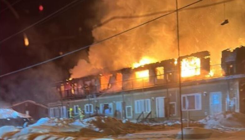 Flames engulf a building in northern Manitoba.