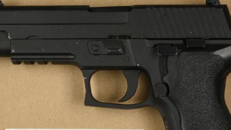 Photo of an object described by investigators as an item but resembles a handgun.