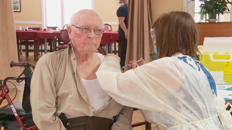 person getting covid vaccine