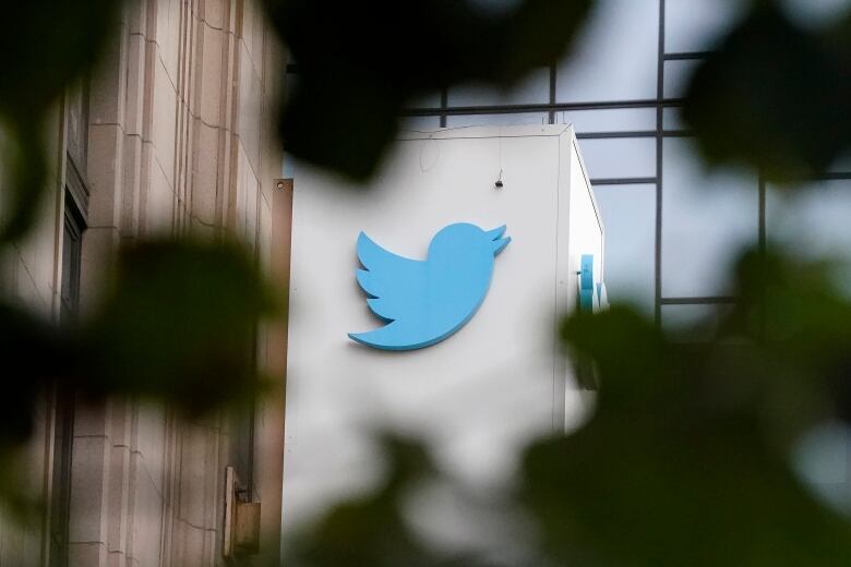 A sign of the blue bird Twitter logo on its headquarters office building.