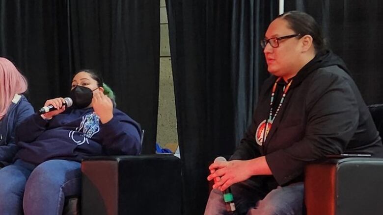 Three Indigenous live streamers speaking at a panel