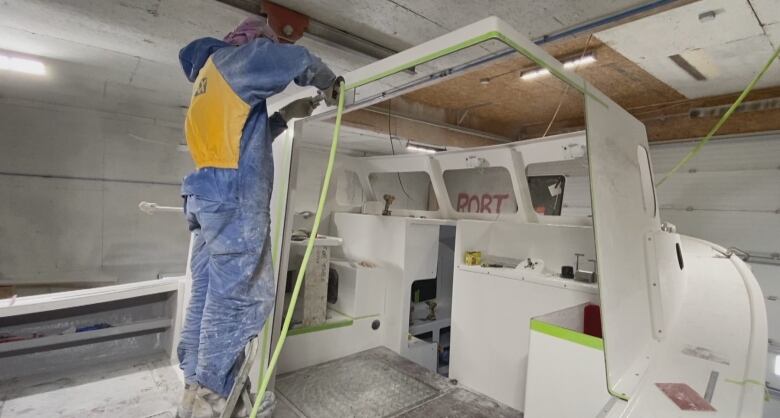 person working on a boat 