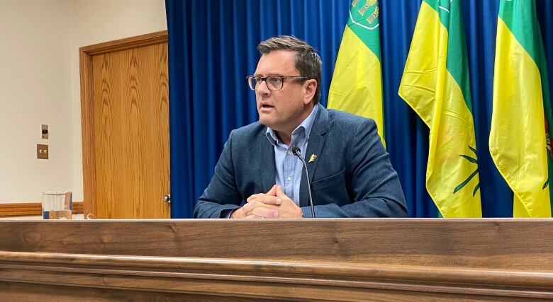 Man speaking at a press conference