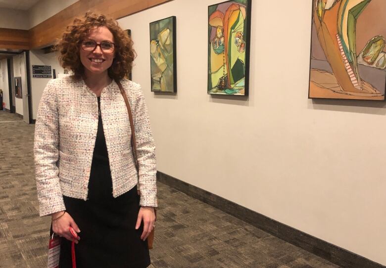 Photo of JIll Promoli in a hallway at the Hamilton Convention Centre. 