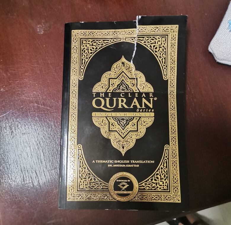 A copy of the torn Qur'an.