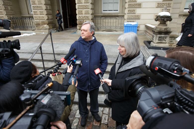 Clayton and Linda Babcock, parents of Laura Babcock, speak to media outside the Ontario Court of Appeal in Toronto on March 13, 2023.