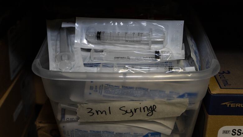 syringes in a container