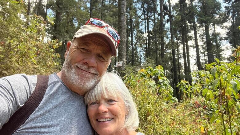 Richard Latrielle and Christiane Faubert pose for a photo from their vacation in Mexico.