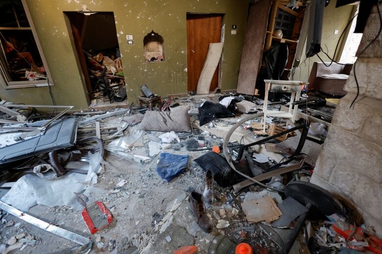 A house in disarray after a police raid.