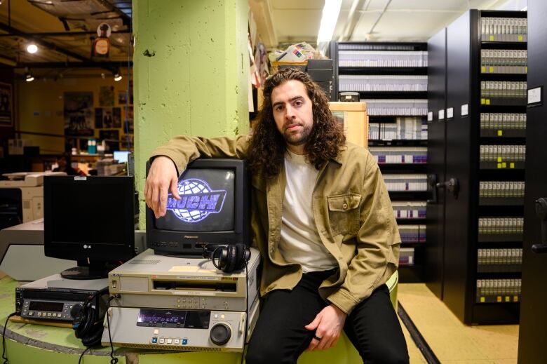 Filmmaker Sean Menard poses for a portrait in the Much Music archives at 299 Queen Street West in Toronto.