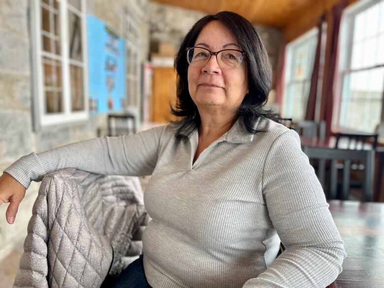 Rheena Diabo, chair of the Finance Administration Committee, sits at the St. Francis Xavier Mission in Kahnaw:ke, south of Montreal.  