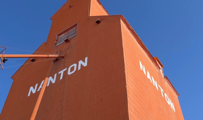 One of Nantons grain elevators pictured on a blue sky day in March 2023. 