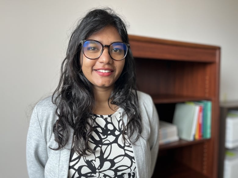 Sweta Daboo, the executive director for the P.E.I. Coalition for Women in Government, stands facing the camera.