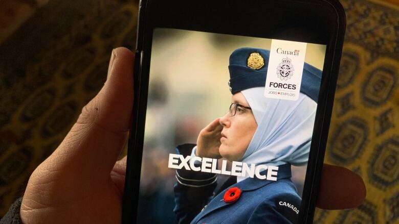 A female Canadian military officer appears in a Department of National Defence recruitment ad. 