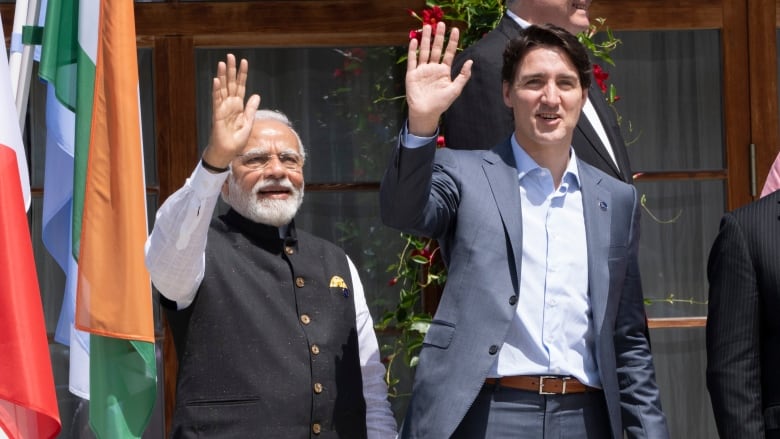 Prime Minister Justin Trudeau and Indian Prime Minister Narendra Modi wave during a family photo with Partner Countries and International Organizations at the G7 Summit in Schloss Elmau on Monday, June 27, 2022. 