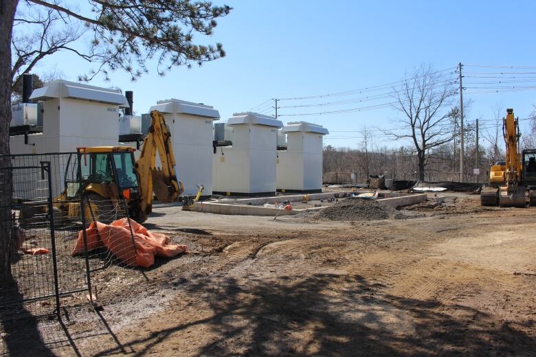 A construction zone, with four generator structures.