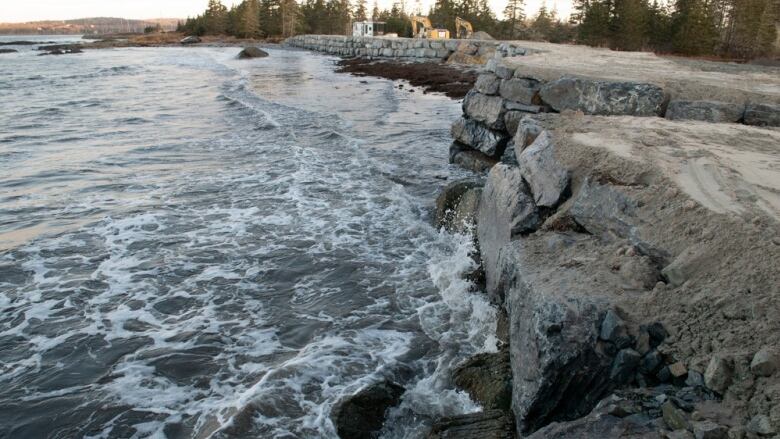 ocean lapping up against seawall