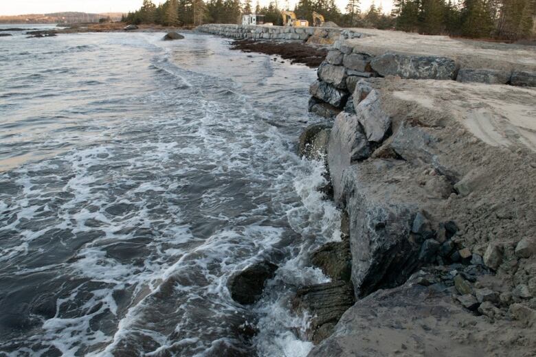 ocean lapping up against seawall