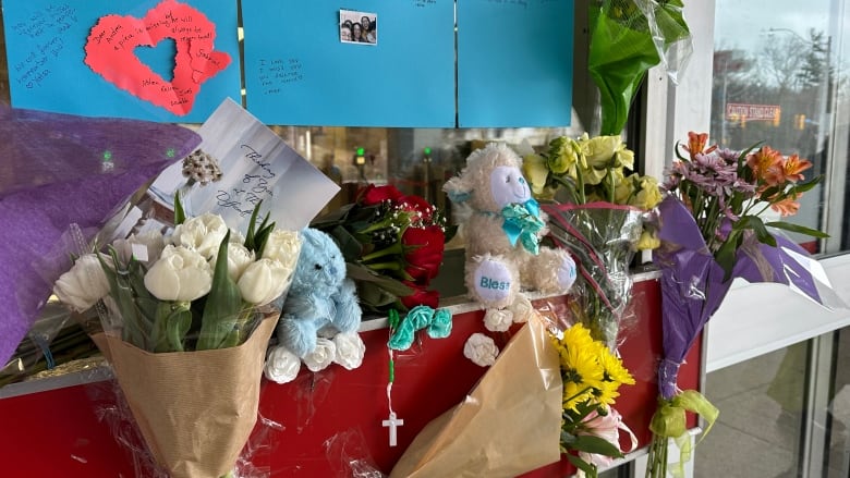 A small memorial next to the entrance of Keele subway station left by friends of Gabriel Magalhaes, 16, who was fatally stabbed inside the station over the weekend.