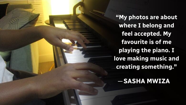 The hands of a girl on a piano keyboard.