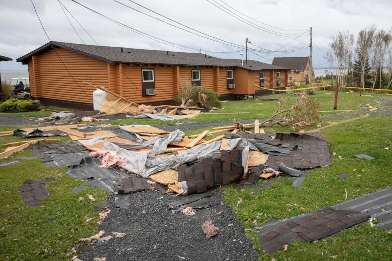 Debris strewn around century-old cabins at Pictou Lodge following Hurricane Fiona