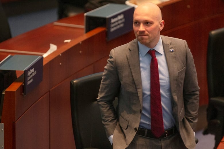 Toronto city councillor Brad Bradford attends a council session in Toronto, Wednesday, March 29, 2023. Bradford has announced that he will run in the forthcoming by-election in Torontos Mayoral race following the resignation of John Tory. THE CANADIAN PRESS/Chris Young