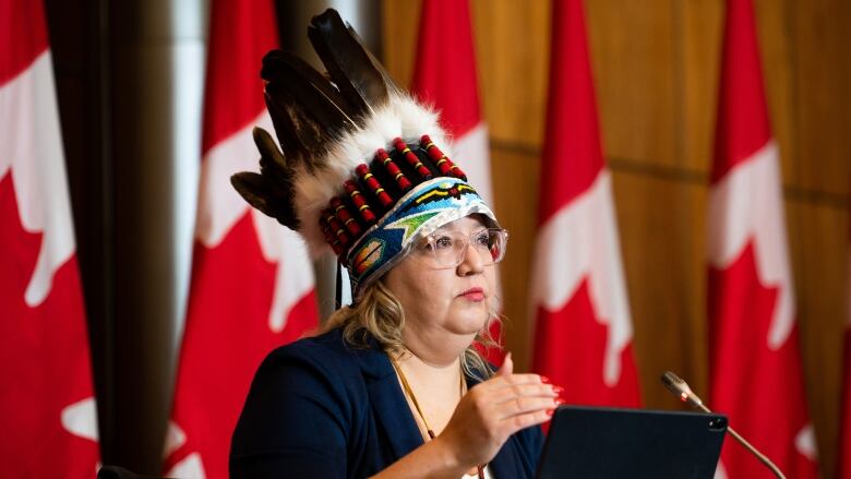 Manitoba Regional Chief Cindy Woodhouse of the Assembly of First Nations speaks during a press conference on a revised final settlement agreement to compensate First Nations children and families in Ottawa on April 5, 2023.