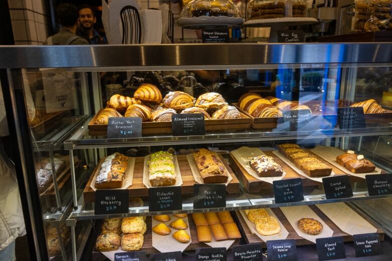 A display tray of croissants  features butter tart croissants.