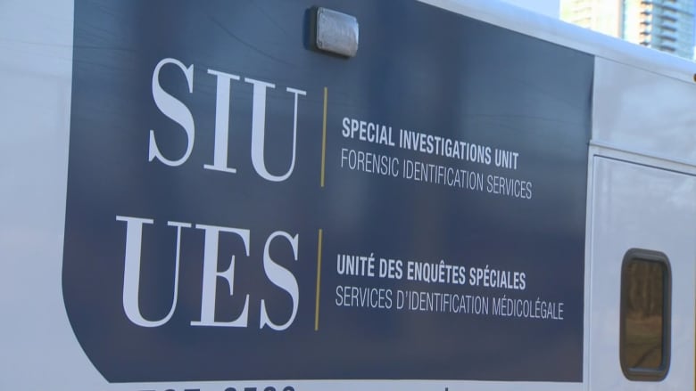 The side of an SIU van that says Special Investigations Unit, Forensic Identification Services. 