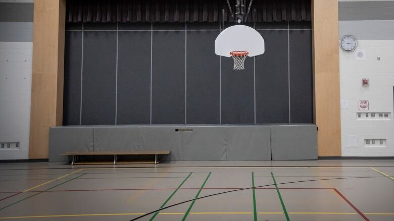 An empty school gymnasium.