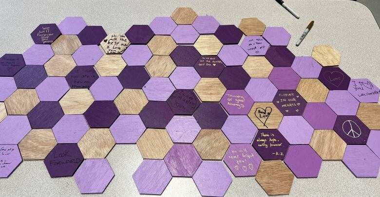 Hexagons filled with messages of love and remembrance