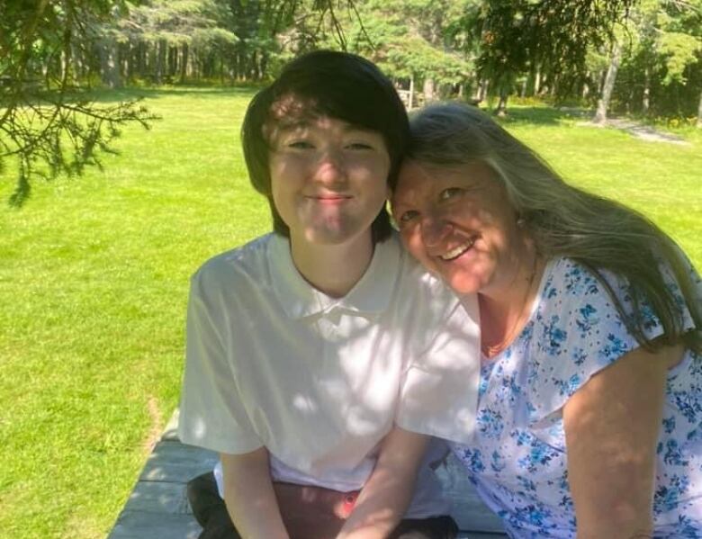 Seelie Romard, is pictured with his mother, Lisa Romard 