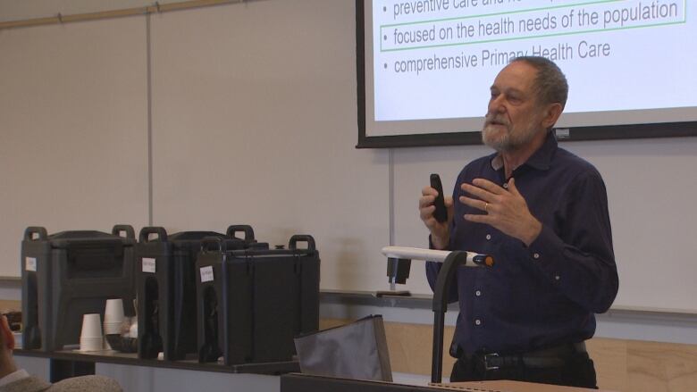 Dr. Roger Strasser gives a presentation on the new medical school at SFU to Surrey community leaders Apr. 6.