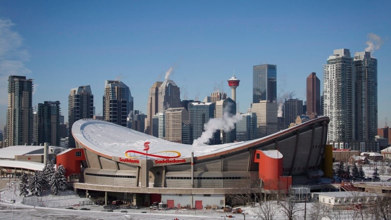 A building is shown along a downtown skyline.