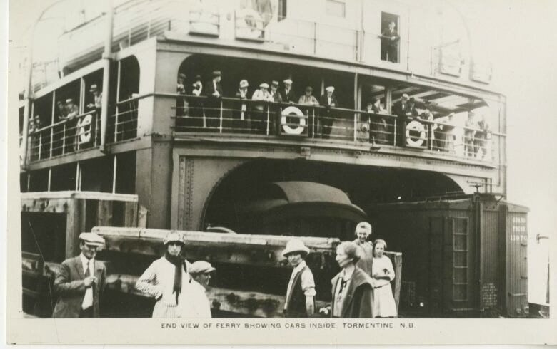 postcard showing ferry and people on board